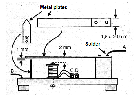 Figure 2 - Assembling the experimental relay using scrap material. Figure 2 - Assembling the experimental relay using scrap material.